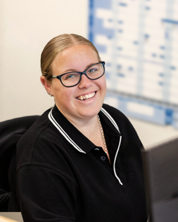 Kookabase team member at the dispatch desk in Brisbane